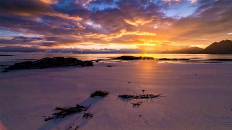 Sandy beach at sunset wallpaper