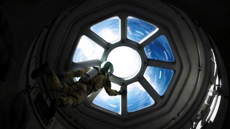 Astronaut in the spacecraft wallpaper