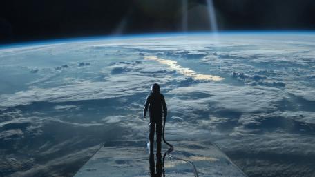 Cosmonaut above the Earth wallpaper