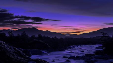 Serene Evening Landscape with River Flowing wallpaper