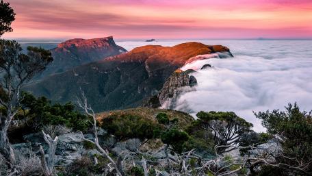 Mountains Touching Pink Sky wallpaper