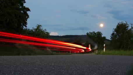 Red light trails on the road wallpaper
