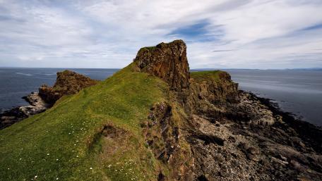 Majestic Scottish Cliffs Serenity Amidst Nature's Grandeur wallpaper