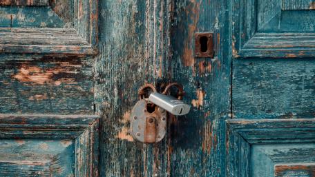 Wooden door with padlock wallpaper