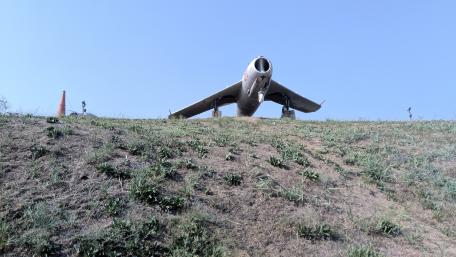 Military Drone on a Landscape Hilltop View for Wallpaper wallpaper