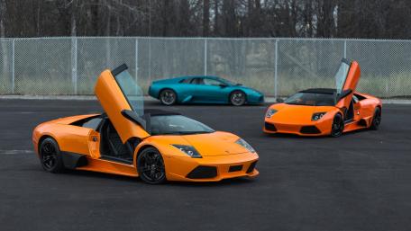 Lamborghini Supercar Trio in Vibrant Colors wallpaper