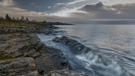 Rocky Coastline Serenity at Dawn wallpaper