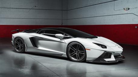 White Lamborghini Aventador in Industrial Setting wallpaper