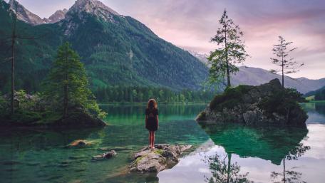 Girl standing in middle of the Hintersee Lake, Germany wallpaper