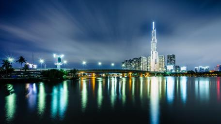Stunning Night Cityscape with Vibrant Reflections wallpaper