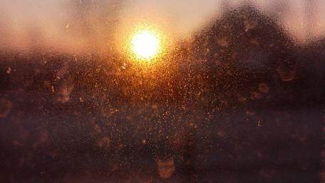Blurry sunset behind the window wallpaper