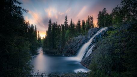 Tranquil Forest Waterfall at Sunset wallpaper