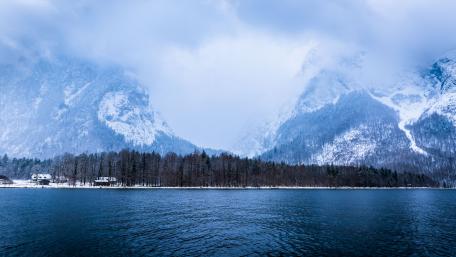 Serene Winter Landscape Overlooking a Tranquil Lake wallpaper