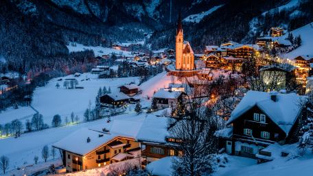 Snowy Village at Twilight in 4K Clarity wallpaper