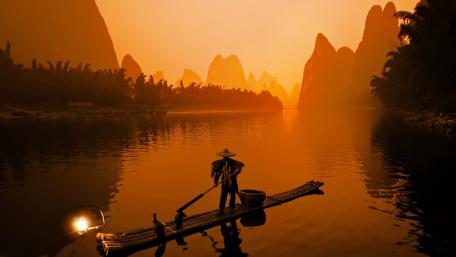 Serene Sunset Journey on Tranquil Waters wallpaper