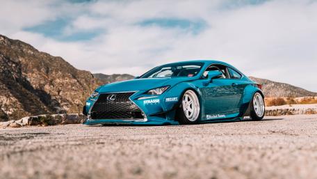 High-Performance Car on Scenic Drive wallpaper