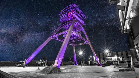 Mystical Tower Under Cosmic Skies wallpaper