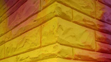 Vibrant Textured Walls in Warm Hues wallpaper