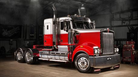 Majestic Powerhouse: Iconic Red Truck in Spotlight wallpaper