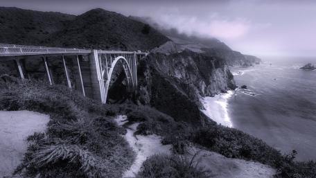 Majestic Coastal Bridge in Monochrome wallpaper