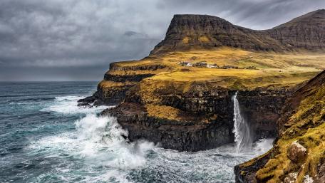Majestic Coastal Waterfall and Cliffs wallpaper