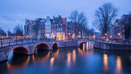 Serene Blue Hour Over Amsterdam Canals wallpaper
