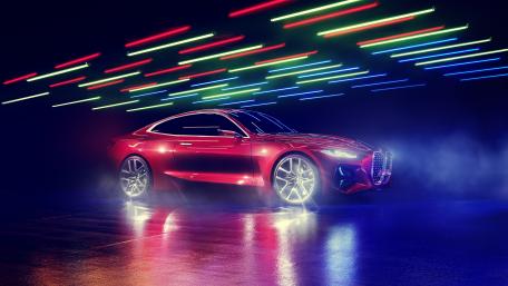 Sleek Red Car in Neon Lights Gallery wallpaper