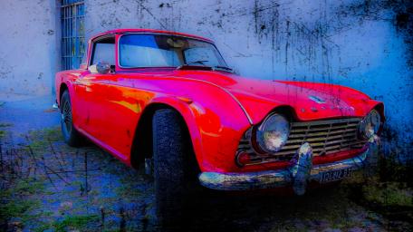 Retro Red Vintage Car on Display wallpaper