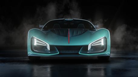 Sleek Modern Supercar in Fiery Green Glow 4K wallpaper