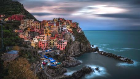 Colorful Coastal Cityscape by the Sea wallpaper