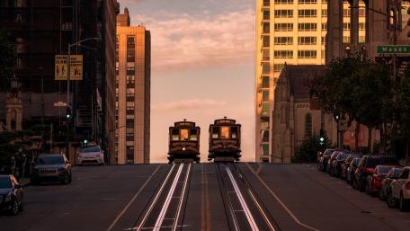 Golden Hour Trams in the City wallpaper