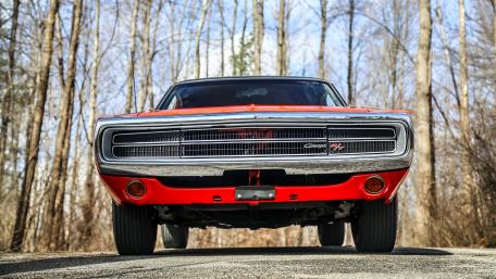Classic Muscle Car in Forest Setting wallpaper