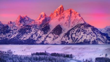Sunset Over Snowy Peaks wallpaper
