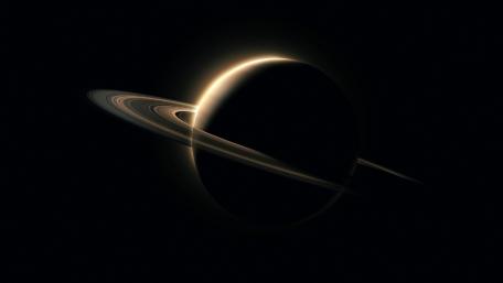 Ethereal Ringed Planet in Cosmic Darkness wallpaper