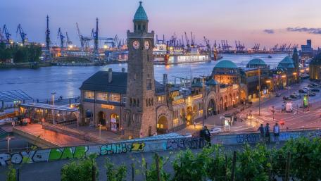 Stunning Waterfront View of a City at Dusk wallpaper