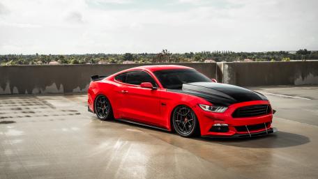 Red Mustang on Rooftop Paradise wallpaper
