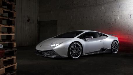 Sleek Silver Lamborghini in a Dramatic Setting wallpaper