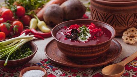 Vibrant Beetroot Soup with Fresh Ingredients and Herbs wallpaper