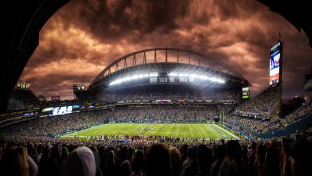 Golden Skies Over Stadium Showdown wallpaper