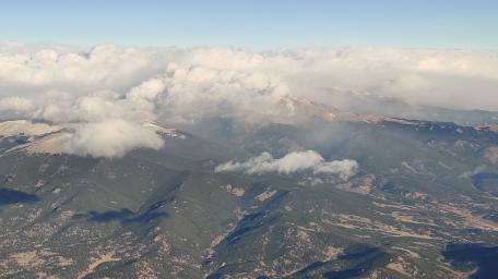Majestic Mountain Views Above the Clouds wallpaper