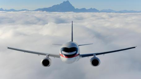 Sukhoi SuperJet 100 Flying off the Coast of Italy near Turin wallpaper