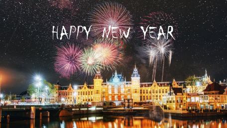 Dazzling New Year Fireworks Display Over the Cityscape wallpaper