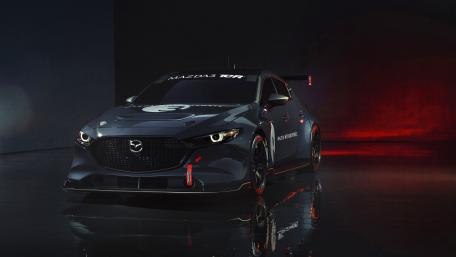 Sleek Mazda3 on a Dramatic Red Stage wallpaper