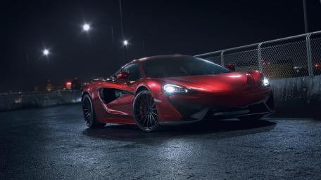 Sleek Red Sports Car at Night wallpaper