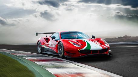 Dynamic Red Sports Car Racing Wallpaper wallpaper