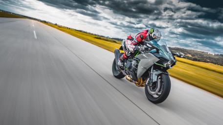 High-Speed Motorbike Ride on Open Road wallpaper