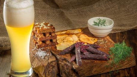 Delightful Snack Platter with Beer and Chips wallpaper