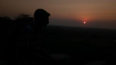 boy enjoying sunset wallpaper
