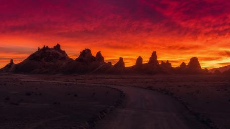 Majestic Sunset Over Desert Road wallpaper
