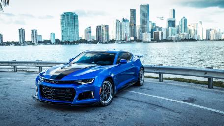 Blue Camaro by Waterfront Cityscape wallpaper